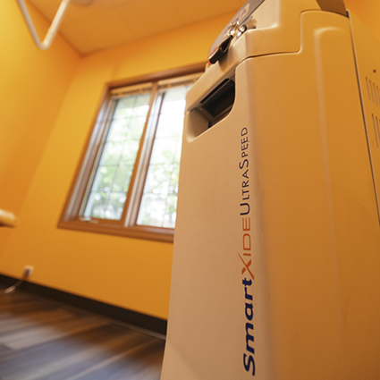 Close up of device attached to dental laser